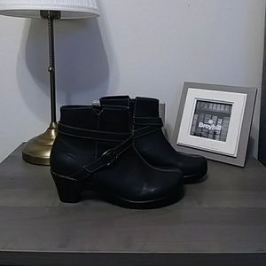 Black ankle booties with white stitching